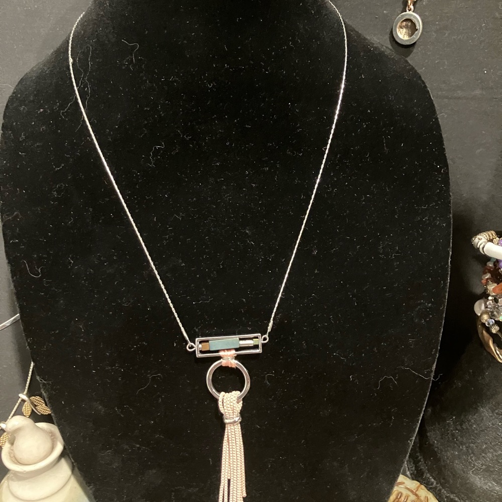 Handcrafted necklace with makers mark H